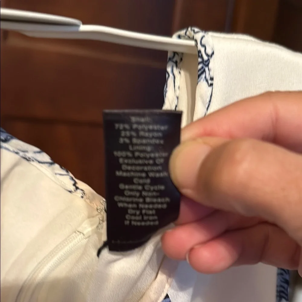 Ann‎ Taylor  Dress in Classic ivory w/ floral patterned piping. Worn about 4x